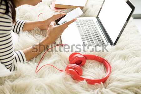 A beautiful caucasian woman lying down on the bed pretty girl us Stock photo © snowing