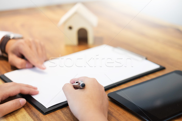 customer signing contract, agreed terms and approved application Stock photo © snowing