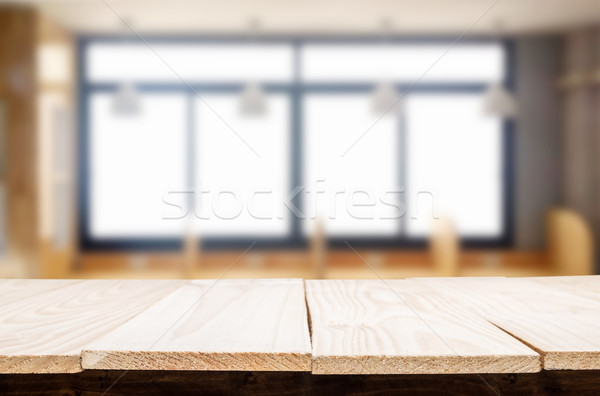 Empty of wood table top on blur of window glass in the morning b Stock photo © snowing