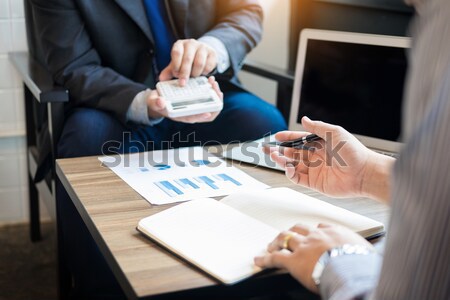 Businessman team working at office desk and using a digital comp Stock photo © snowing