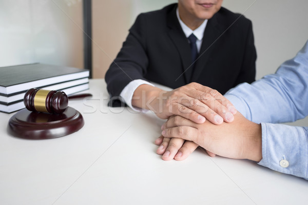 Mature male lawyer or notary with client deciding on marriage di Stock photo © snowing
