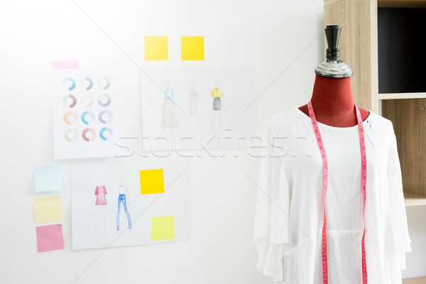 garment design on mannequin Red dummy with measuring tape in tai Stock photo © snowing