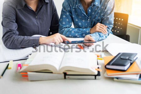 Young students campus helps friend catching up and learning tuto Stock photo © snowing