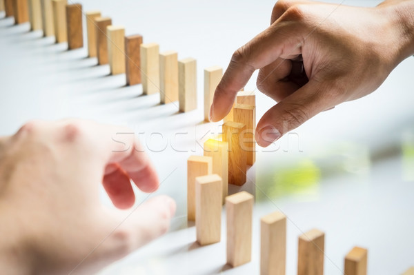 Place a wooden block lines Business team solving a problem Stock photo © snowing
