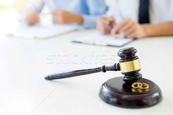 Angry couple arguing telling their problems to Judge gavel decid Stock photo © snowing