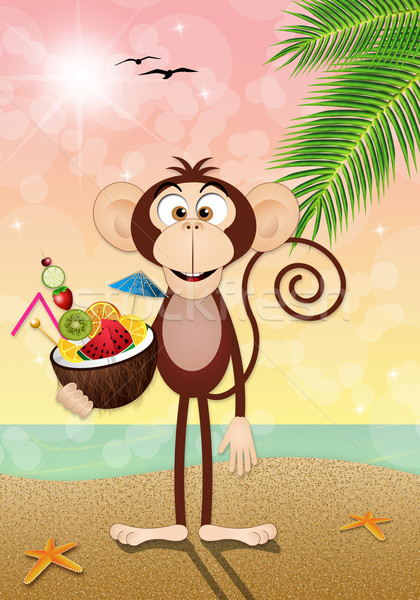 Monkey with coconut cocktail on the beach Stock photo © sognolucido