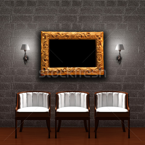 Three chair with empty frame and sconces in dark minimalist inte Stock photo © sommersby