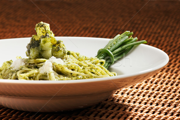 Stock photo: Pesto pasta is an Italian staple food