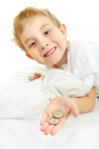 Young boy with a lost tooth, holding money from the tooth fairy Stock photo © soupstock