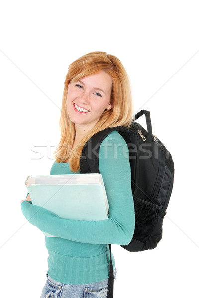 Happy student holding a book Stock photo © soupstock