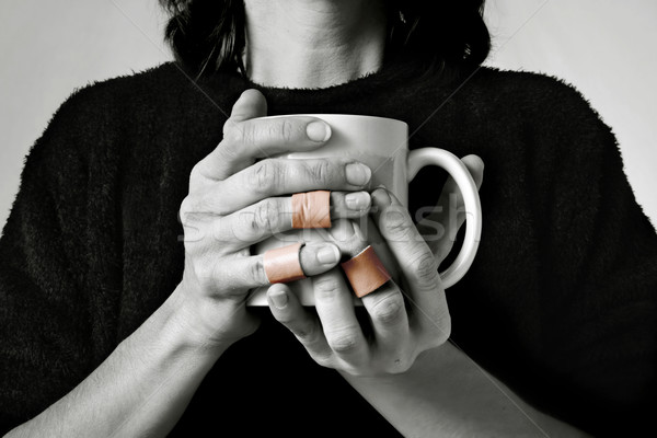Lavoro mani donne tazza di caffè dita Foto d'archivio © soupstock
