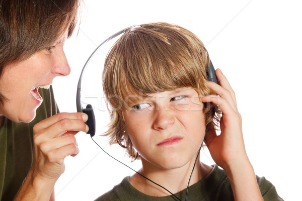 Moeder hoofdtelefoon af zoon muziek gezicht Stockfoto © soupstock