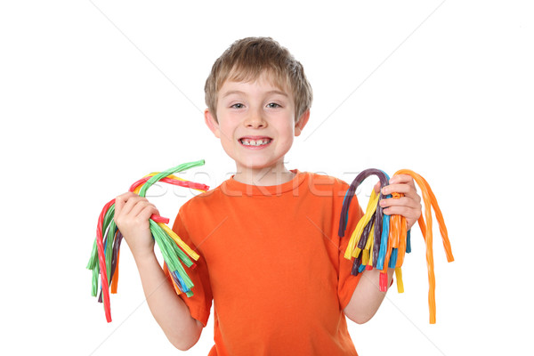 Boy holding colorful licorice candy Stock photo © soupstock
