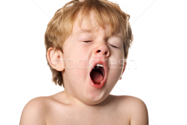 Casca obosit băiat gură faţă tineri Imagine de stoc © soupstock