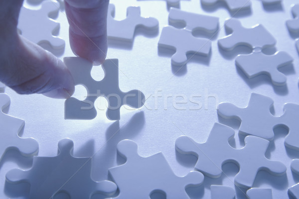 Auswahl Puzzle Stück Finger halten Stock foto © spanishalex