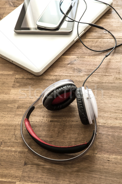 Digital devices and Headphones on a wooden Desktop	 Stock photo © Spectral