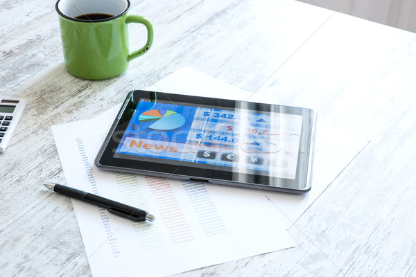 Stock photo: Stock market trading app on a Tablet PC	