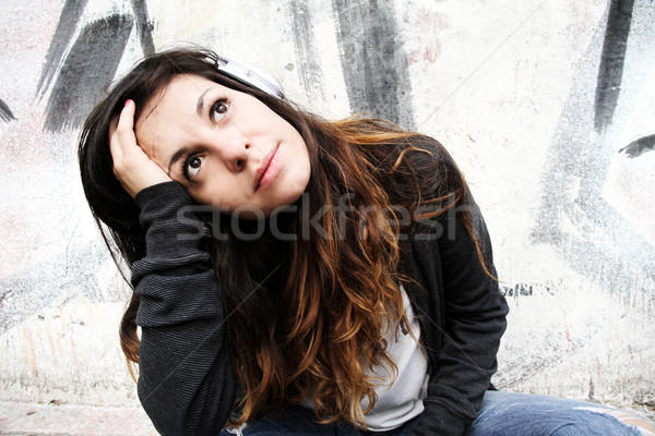 Melankolik müzik genç kadın dinleme oturma kaldırım Stok fotoğraf © Spectral