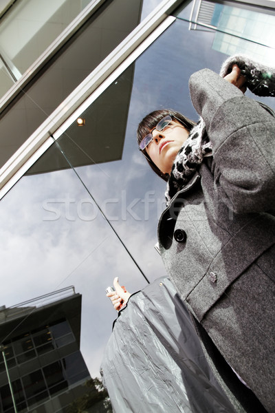 Business woman carrying cloth Stock photo © Spectral