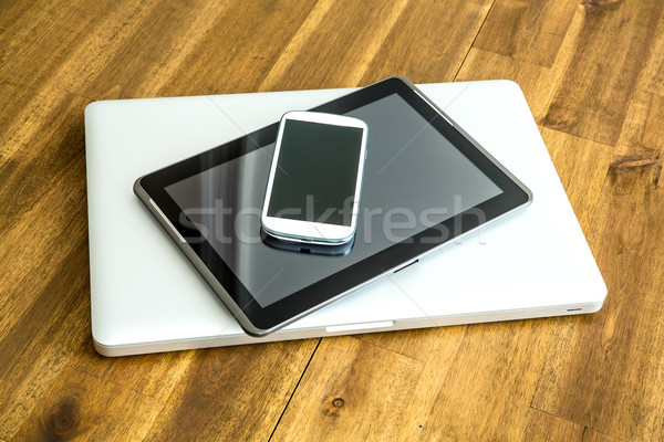 Digital devices on a wooden Desktop Stock photo © Spectral