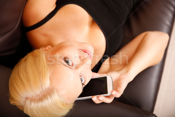 Stock photo: Girl talking with a Smartphone	