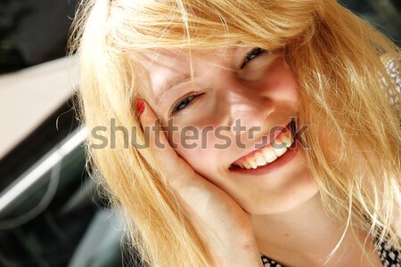 Smiling young woman in the sunlight	 Stock photo © Spectral