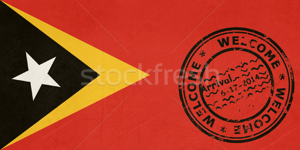 Welcome to East Timor flag with passport stamp Stock photo © speedfighter