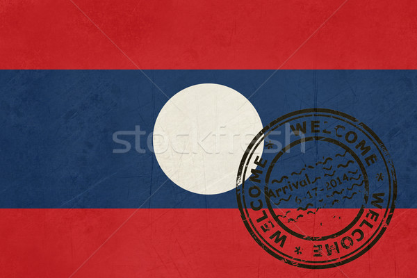 Foto stock: Bem-vindo · Laos · bandeira · passaporte · carimbo · viajar