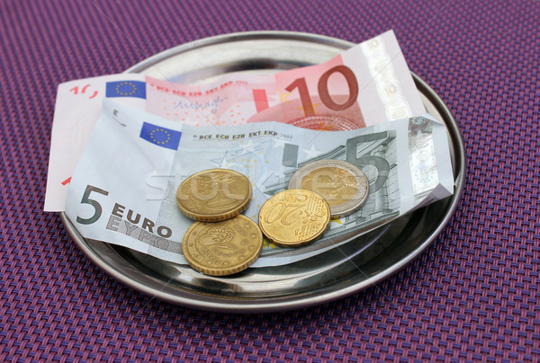 Euro tips on restaurant table Stock photo © speedfighter