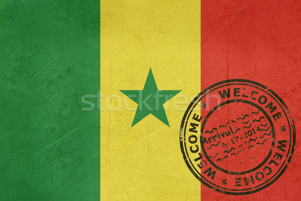 Stock photo: Welcome to Senegal flag with passport stamp