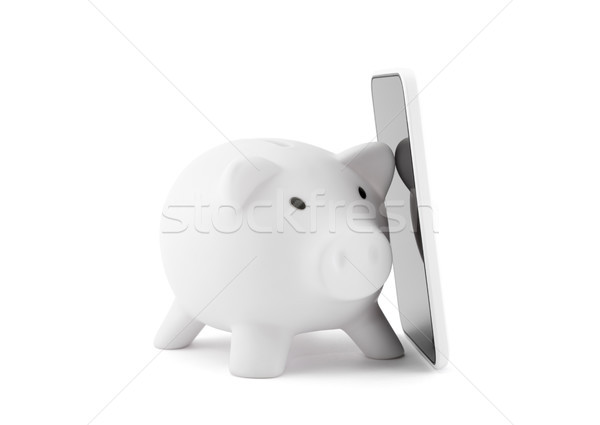 White piggy bank with mobile phone Stock photo © sqback