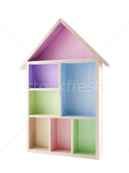 Stock photo: Colorful wooden house shaped shelf isolated on white 