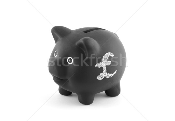 Black piggy bank with pound sign. Clipping path included. Stock photo © sqback