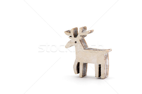 Stock photo: Wooden reindeer Christmas decoration on white background 