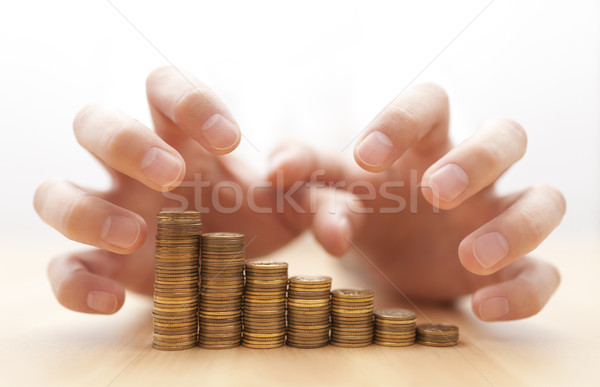 Chciwość ceny ręce monet strony finansów Zdjęcia stock © sqback