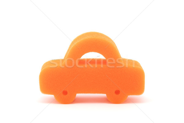 Stock photo: Orange car shape sponge on white background 