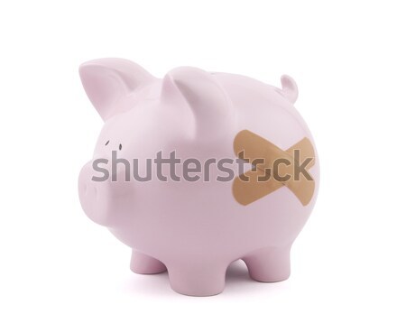 Piggy bank with plaster. Clipping path included. Stock photo © sqback