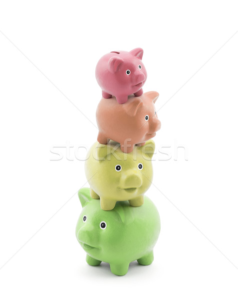 Stock photo: Stack of colorful piggy banks. Energy saving concept. 