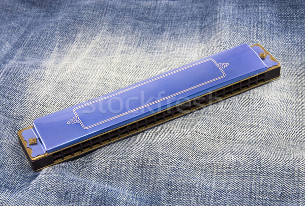 Stock photo: Blue harmonica