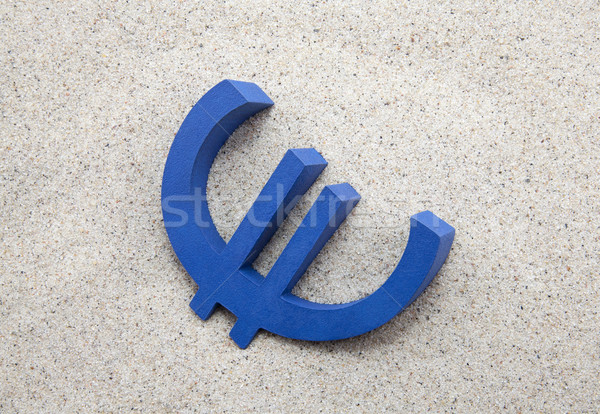 Blue euro symbol in the sand Stock photo © sqback