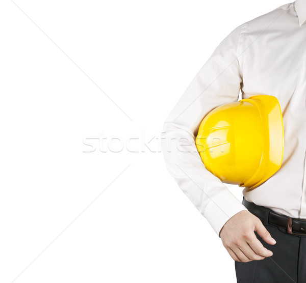 Engineer in white shirt holding yellow helmet isolated on white with clipping path  Stock photo © sqback