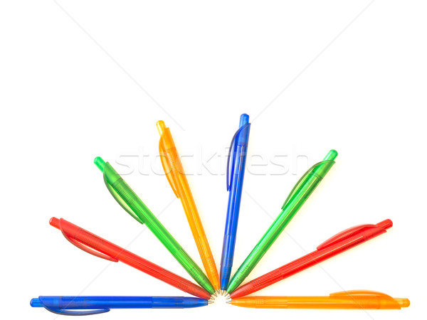 Multicolored ballpoint pens in half sun form Stock photo © SRNR