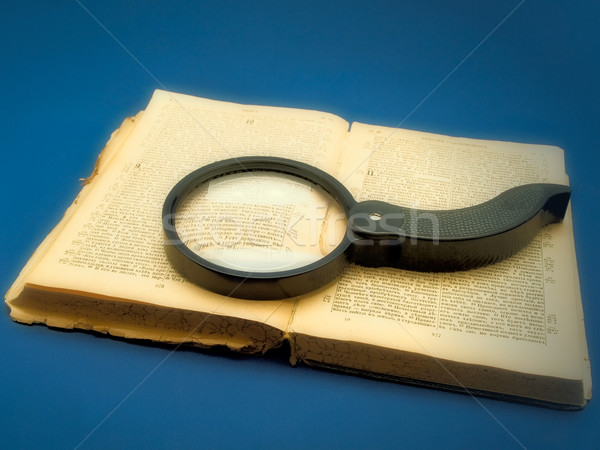 magnifier at the book Stock photo © SRNR