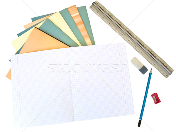 Notebooks, pencil, eraser, ruler and sharpener at the white table Stock photo © SRNR