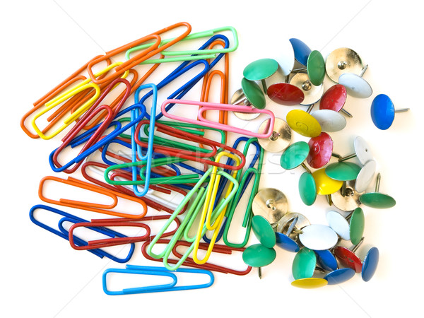 Some multicolored pins and paper clips at the white table Stock photo © SRNR