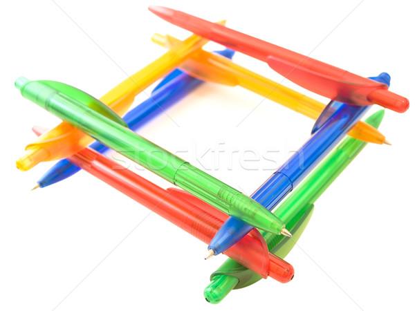 Multicolored ballpoint pens in 	well form Stock photo © SRNR