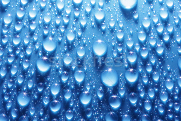 Shiny water drops on metallic blue surface Stock photo © SSilver