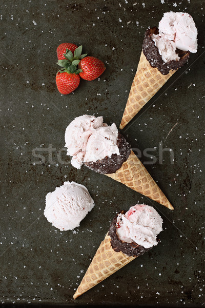 Strawberry Ice Cream Cones over Rustic Background Stock photo © StephanieFrey