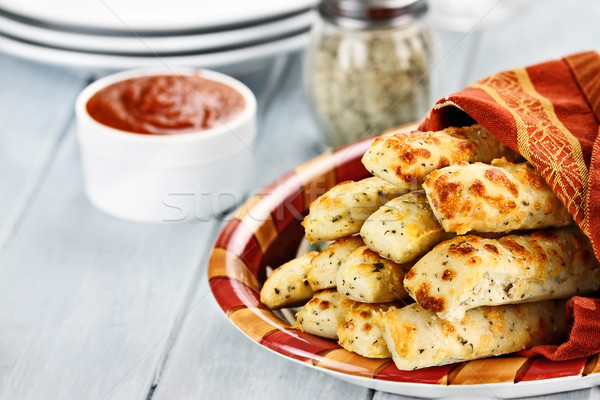 Cheesy Asiago Breadsticks and Marinara Sauce Stock photo © StephanieFrey