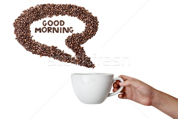 Isolated Hand Holding Cup and Coffee Bean Speech Bubble Stock photo © StephanieFrey